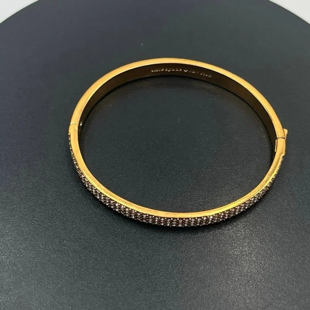 Kate Spade NY Heavy‎ Metals Row Pave Hinged Bangle Bracelet in clear/rose gold
